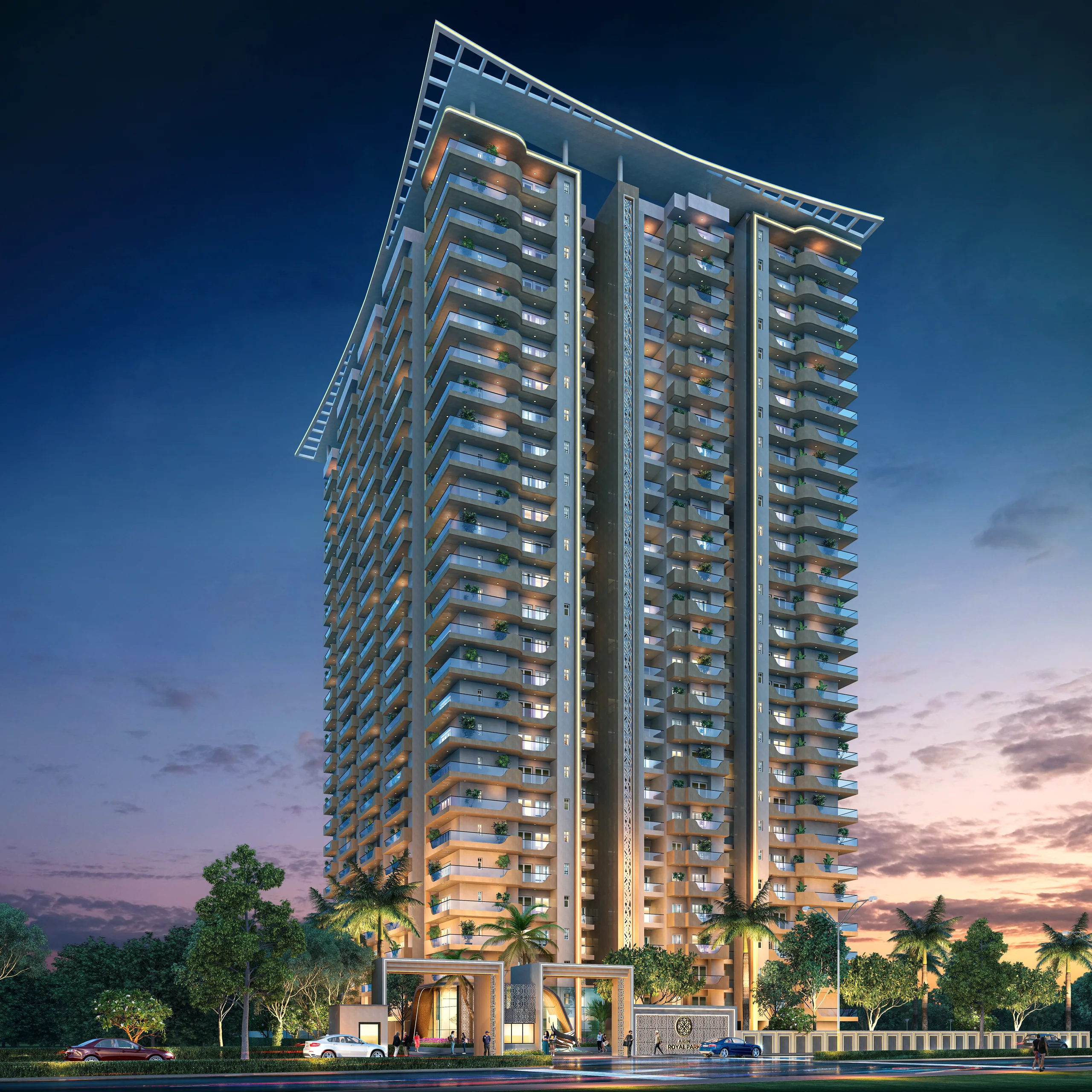 AIGIN Royal Park at dusk, NH-24 Aditya World City Ghaziabad: the illuminated tower elevation above the lit entrance approach and gated boundary along the access road