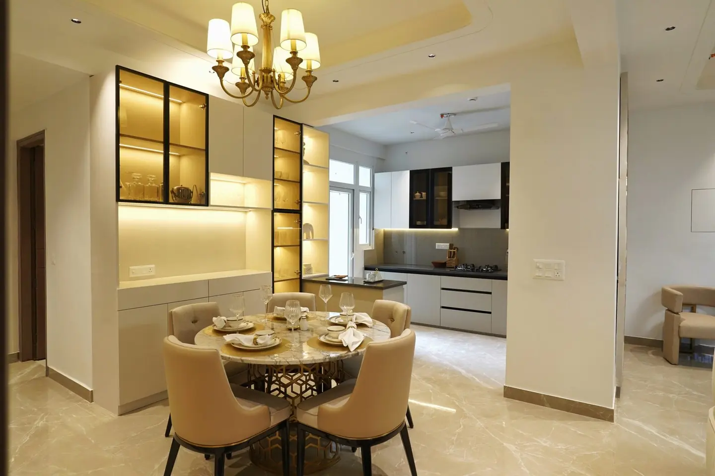 Photograph of the living space in the AIGIN Royal Park sample apartment at Aditya World City, Ghaziabad